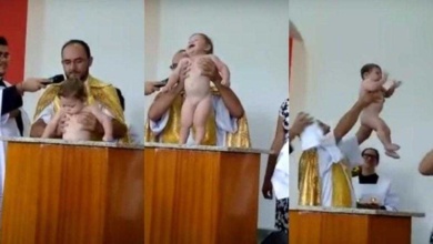 Bebê que bate palmas após batizado,Bebê que bate palmas