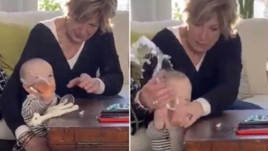 Avó é duramente criticada após ter vídeo divulgado derrubando um bebê para salvar taça de espumante